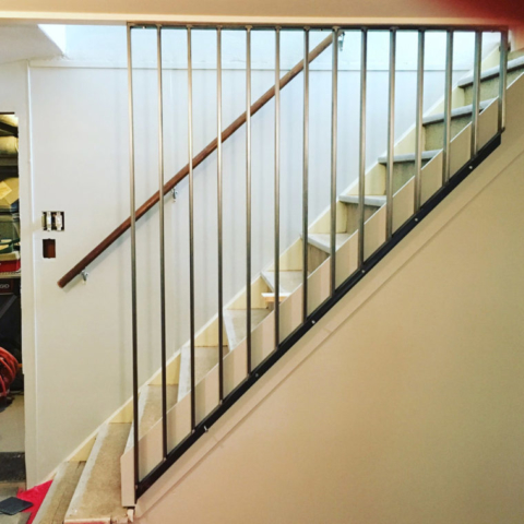 Custom Metal Railing and Wall in Basement